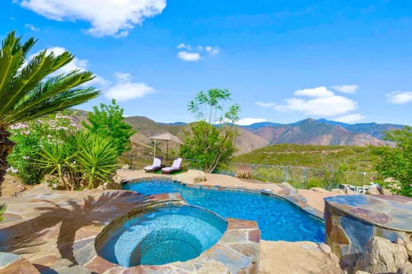 Heated in-ground pool and heated spa that you will love...