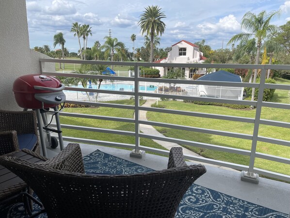 Beautiful pool view from the back veranda. 