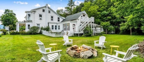Large side yard with outdoor fire pit