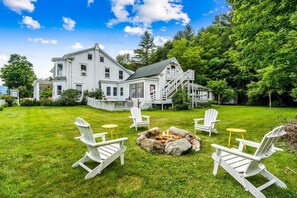 Large side yard with outdoor fire pit