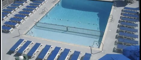 Heated Pool with plenty of lounge chairs. 