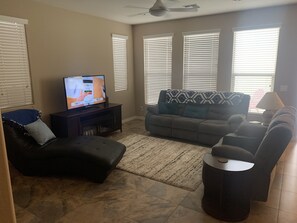 Central living room with TV and wireless internet available