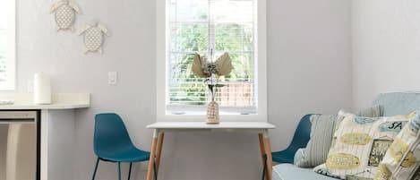 Dining table with 2 chairs.