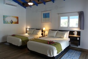 spacious 2 queen bed guest suite with ensuite bathroom and AC unit