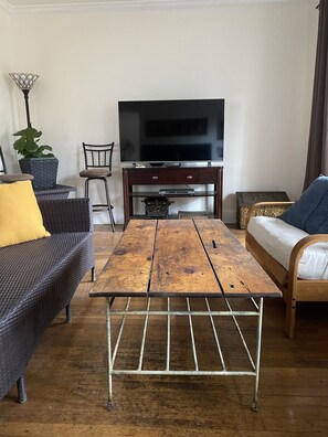 The Travelers Room has 55" TV, Queen sofa, and 2 futons for younger guests.