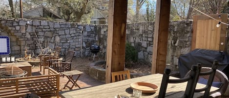 Our Private Courtyard has outdoor lighting, fire pit, and 8 foot privacy wall.