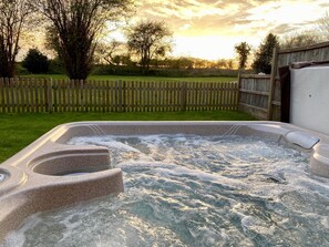 4 person hot tub with countryside views
