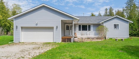 Little Black Bear is a spacious 2,100 sq. ft. bungalow on a very private 2 acre lot, with water access and a boat ramp just down the road! 