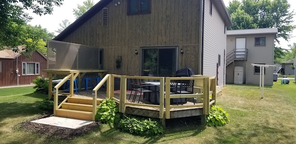 Backyard deck with lots of outdoor seating!