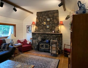 Living room was a stand alone cabin in the 1930's; window shaded & north facing