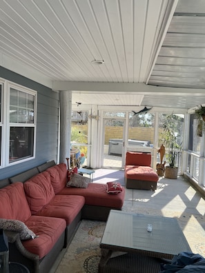 On of the outdoor screened in porches overlooking Back Bay.