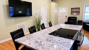 A modern kitchen
Stainless steel appliances, counter top