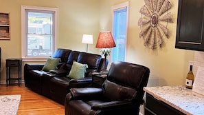 Comfortable seating, a smart tv and tasteful decor