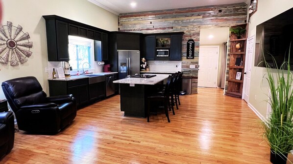 A modern kitchen
Stainless steel appliances, counter top