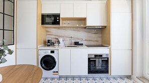 Fully equipped kitchenette. Includes dishwasher and washing machine! #modern