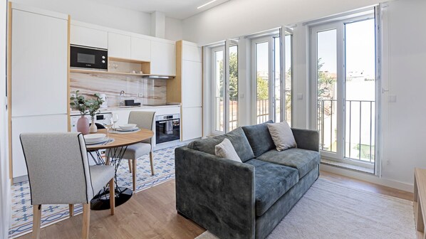 Overview of kitchenette + dining and living area + balcony. Beautifully decorated! #stylish #airbnb
