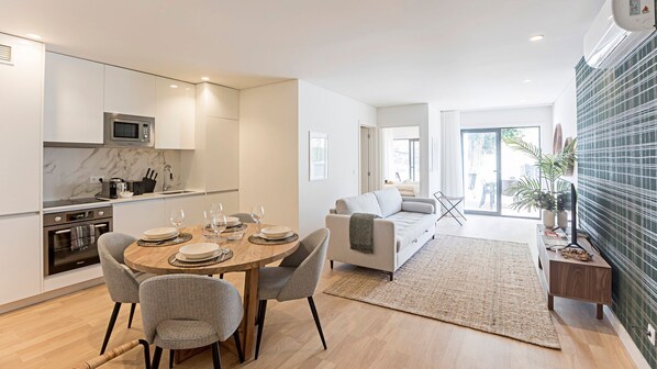 Main living/dining area with a kitchenette and access to the big patio outside. #gorgeous #lovelystay