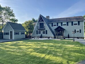 Large house at the end of a cove on a quarter of an acre lot.