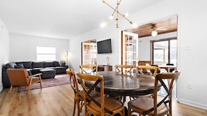 A fully renovated open concept living area with modern touches is the perfect place to gather after a long day of play.