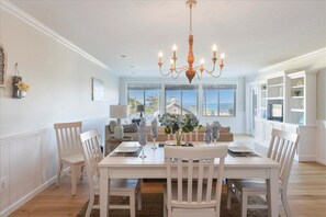 Dining/Living Area with Large Windows with Water Views