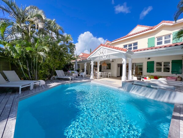 Salt pool and wooden deck in front of the terrace