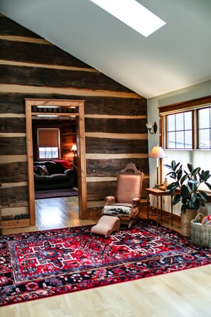 Entryway / seating area looking into the living room