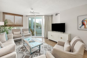 North Breakers 208 - Soothing Beach pallet in living space leading to private balcony