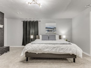 Unwind and relax in the serene ambiance of this charming bedroom.