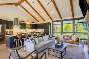Cozy living area with a fireplace and gorgeous natural light