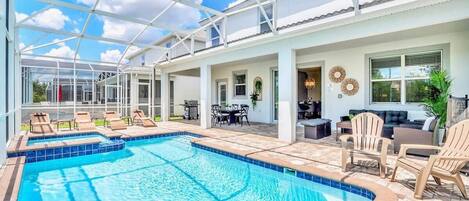 Huge Backyard Patio with Swimming Pool, Hot Tub, Sun Loungers, Shaded Seating Area, BBQ Grill and Poolside Dining Option