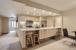 Kitchen bar counter with seating for 3