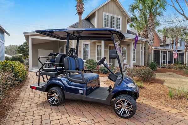 4 Seater golf cart included.