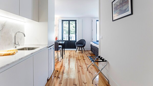 Overview of kitchenette, dining area and bedroom, as well as balcony access. #cozy #lovelystay