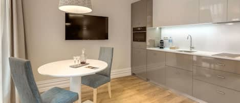 Modern kitchenette for great homecoooked meals and a dining area for 2 #modern #airbnb