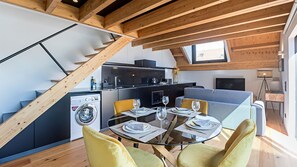 Gorgeous main area with dining table, sofa bed for 2 and fully equipped kitchenette #modern