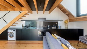 Kitchenette includes electric kettle, microwave, coffee machine, toaster and even a dishwasher and washing machine #kitchen #lovelystay