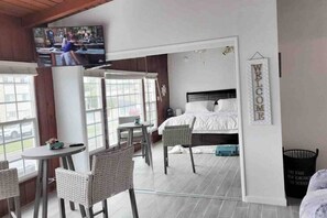 Large Smart TV where you can login to your own streaming apps.
