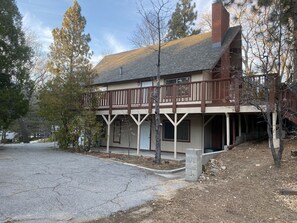 Ground floor entrance. Wrap around deck. 