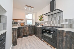 Open plan kitchen with handmade detail.