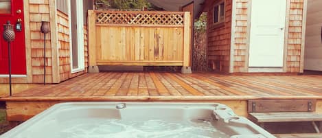 Private hot tub attached to the deck.