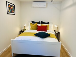 Comfortable queen size bed with new mattress and linen. 
