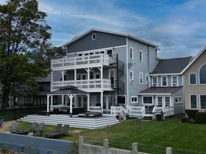 A grand house with a plethora of balconies, offering stunning views from every angle.