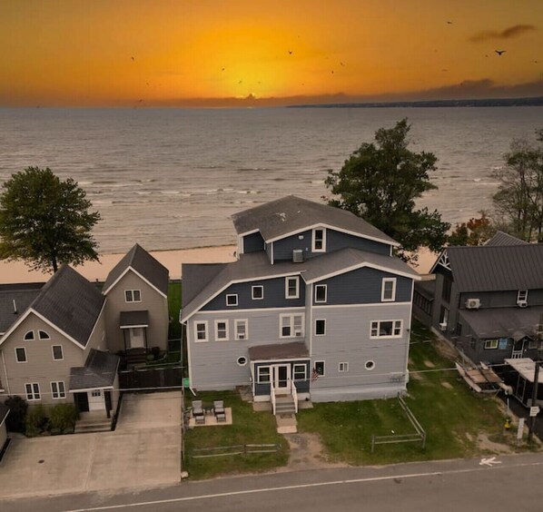 Dreamy beach house at sunset.