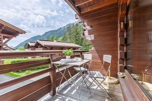 Sunny balcony residence with pool