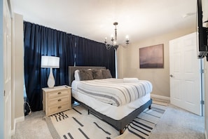 A spacious, inviting bedroom that offers the ultimate comfort for a good night’s rest!