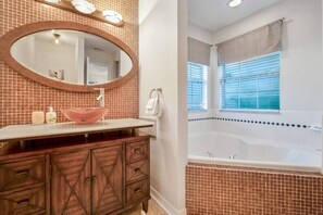 En suite bathroom brimming with style and luxury.