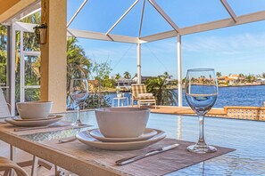 43. Pool View with Table and 6 chairs