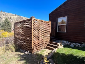 Fenced in deck overlooking river