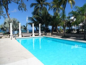 pool area  with shower, changing room, bar.