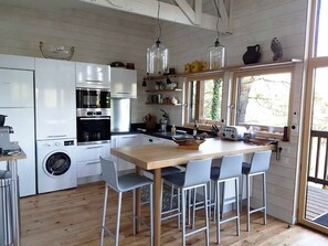 Dining area for 6 people - Open plan living room and kitchen - Large picture windows